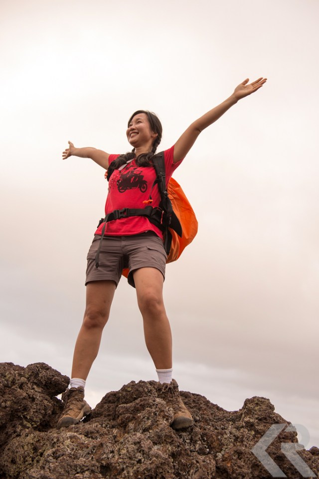 Joyful woman hiking in the Galapagos.