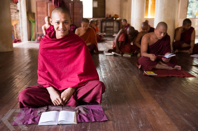Portrait of a young monk studying at a monastery in Myanmar.