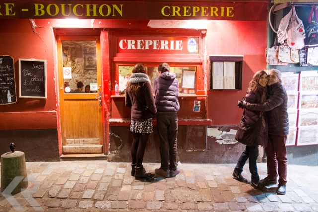 Two couples outside of a crepe stand in Paris