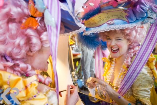 Picture of a woman dressed as Marie Antoinette at Mardi Gras