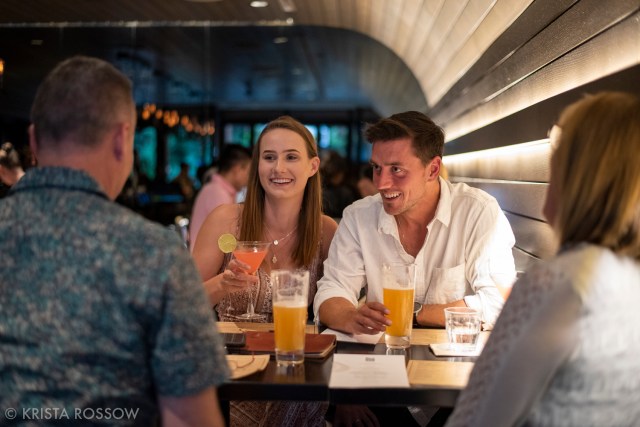 People dine at cozy Bar Oso in Whistler Village, British Columbia, Canada.